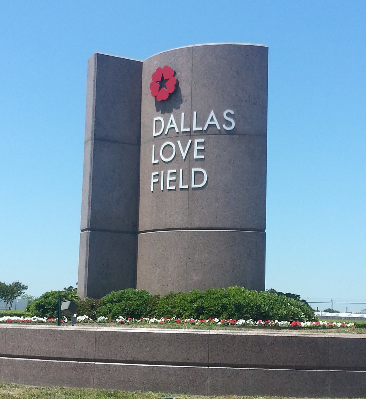 Love Field concrete sign