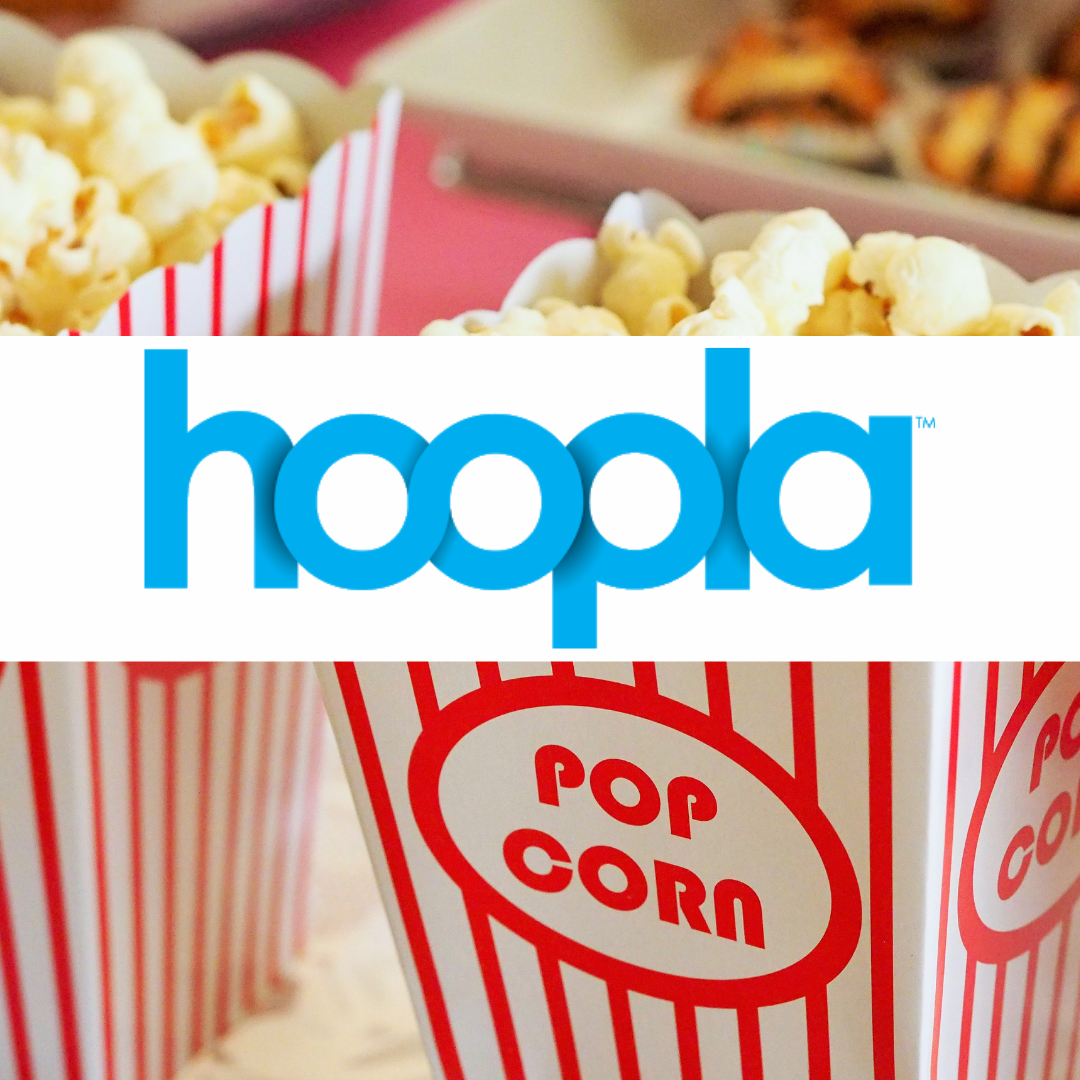 Popcorn in a red and white striped box with a hoopla logo