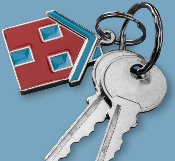 A key chain with a house and two keys